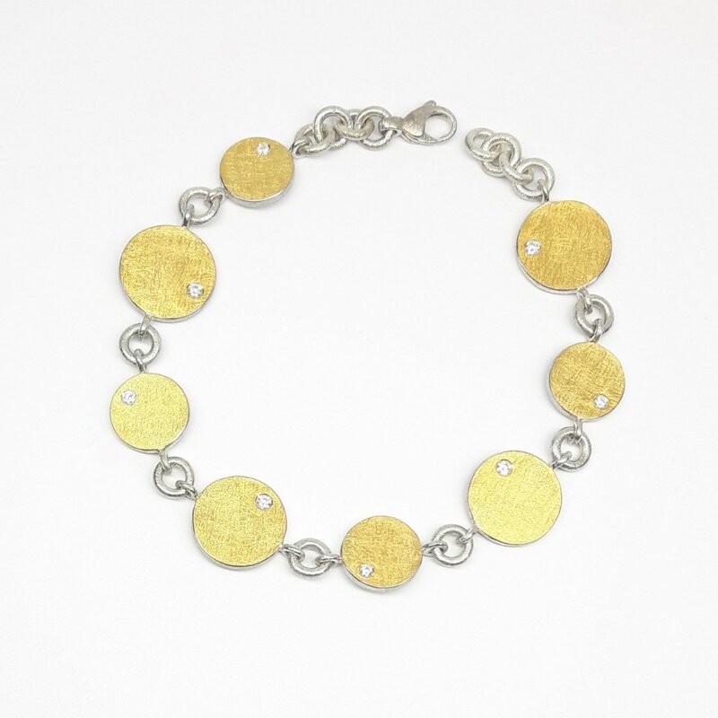 Bracelet en or jaune 24kt, argent 925-. et 8 brillants.