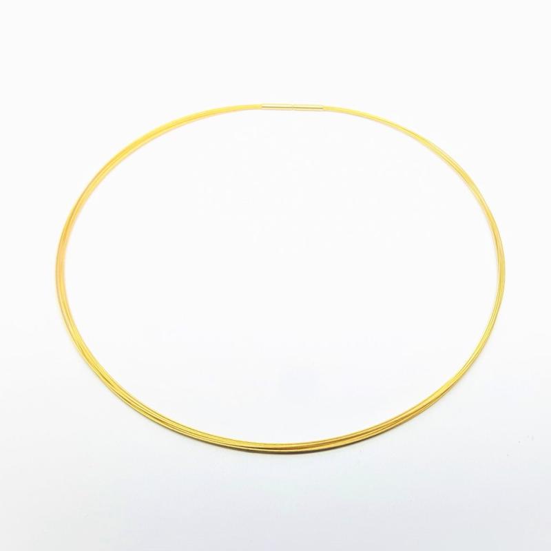 Pendentif en or jaune 18kt et aigue-marine Ø5mm.