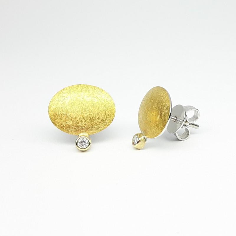 Boucles d'oreilles en argent 925/-, or fin, or jaune 18kt et brillants.