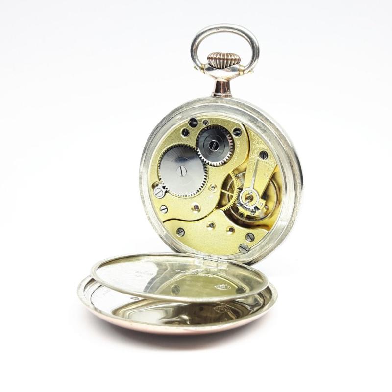 Montre de poche OMEGA, argent 800/-. doré. Vintage en très bon état.